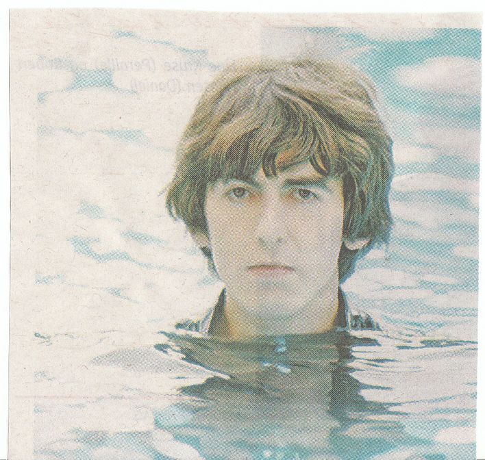 Plakaten fra filmen: Living In The Material World med George Harrison.